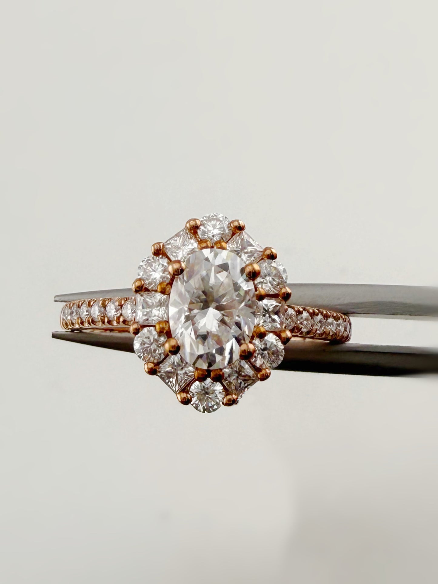 Unique design Oval-cut halo pavé ring