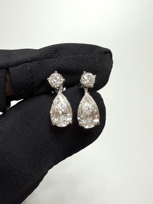 1ct pear-cut and round brilliant earrings